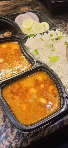 Matar paneer, poori, jeera rice & salad thali — fresh home-cooked meal by Divya's Kitchen Noida